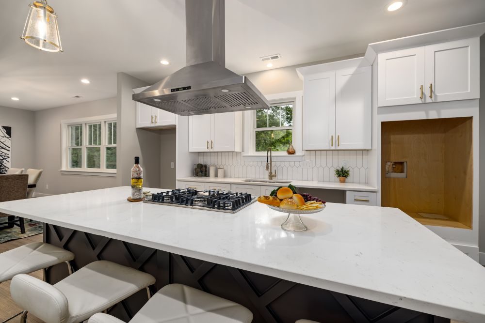 White kitchen with quartz island