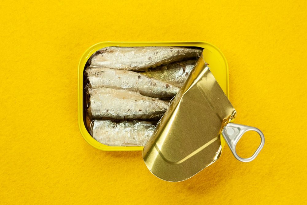 Open tin of sardines